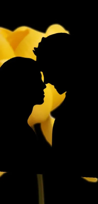 Silhouette of couple with yellow tulips on black background.