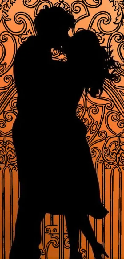 Silhouette of a couple kissing against an orange background with intricate patterns.