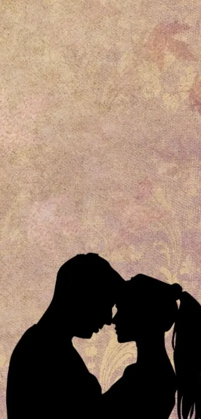 Silhouette of a couple against a vintage floral background.