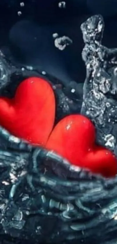 Two red hearts splash in water against a dark blue background.