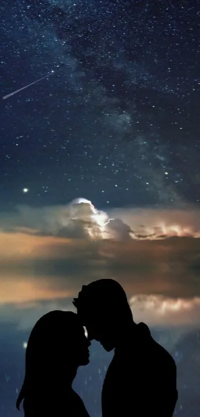 Silhouette of couple under starry sky with sailboat.