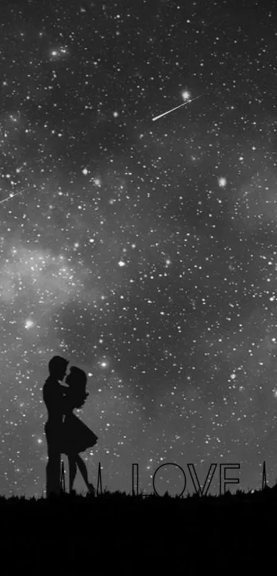 Silhouette couple under starry night sky with love text.