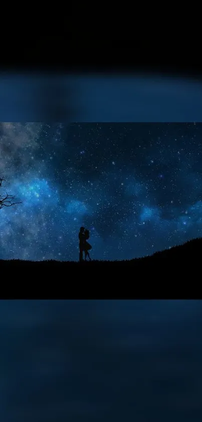 Silhouetted couple under a starry night sky with galaxy backdrop.