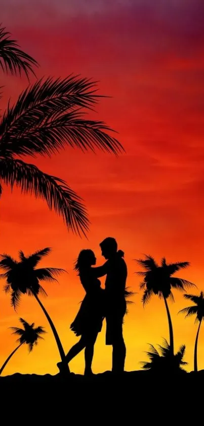 Romantic couple silhouette with palm trees at sunset on a beach.