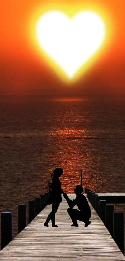 Romantic proposal on pier with heart-shaped sunset.