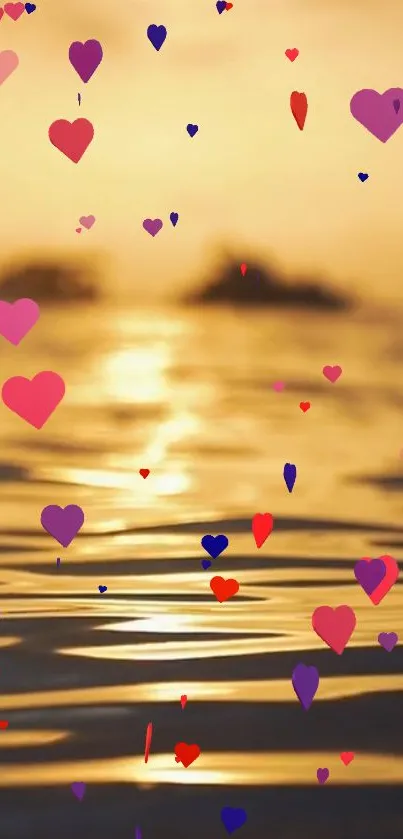 Romantic sunset with floating hearts over a golden ocean.