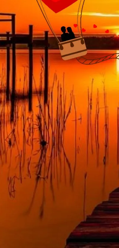 Romantic sunset over a serene lake with hot air balloon silhouette.