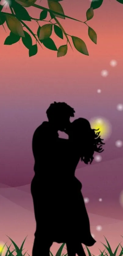 Romantic silhouette of couple at sunset with floating lights and leafy backdrop.