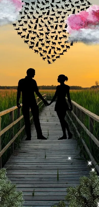 Couple silhouette at sunset with heart-shaped cloud art.