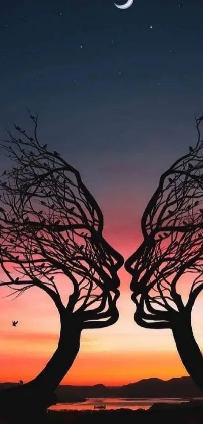 Silhouette tree faces with sunset sky background.