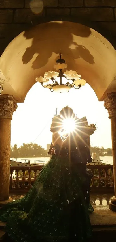 Romantic sunset silhouette through stone archway with golden light.