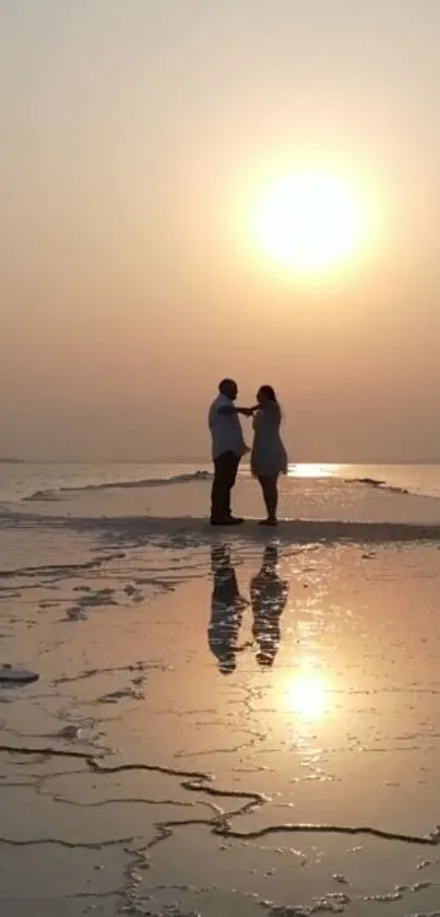 A silhouetted couple on a reflective wetland during sunset, with warm orange hues.