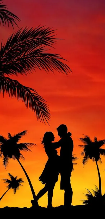 Silhouette of a couple at sunset with palm trees and orange sky.