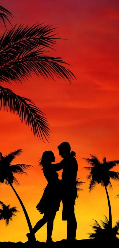 Silhouette of a couple at sunset with palm trees.