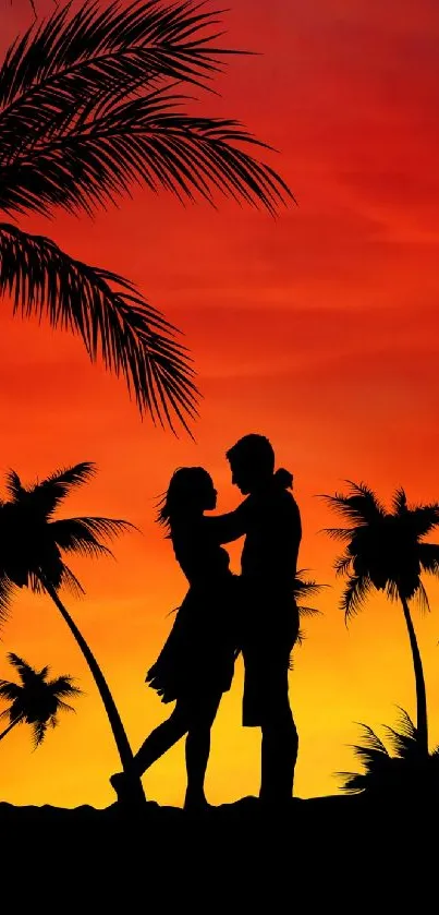 Silhouette of couple under palm trees against sunset.