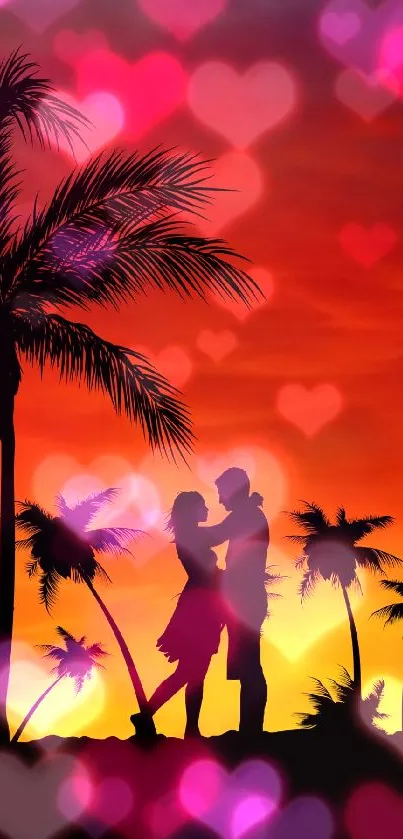 Silhouette of a couple under palm trees during a vibrant tropical sunset.