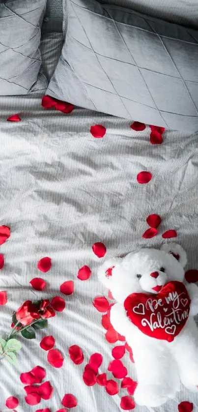 Romantic teddy bear with roses on a gray bed.