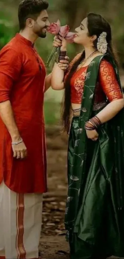 Romantic couple in traditional dress with flowers.