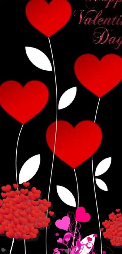 Valentine's Day wallpaper with red hearts on a black background.