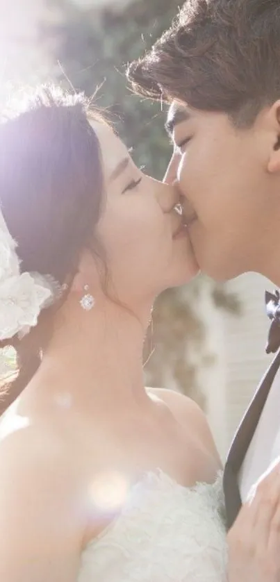 Romantic couple in wedding attire sharing a sweet kiss.