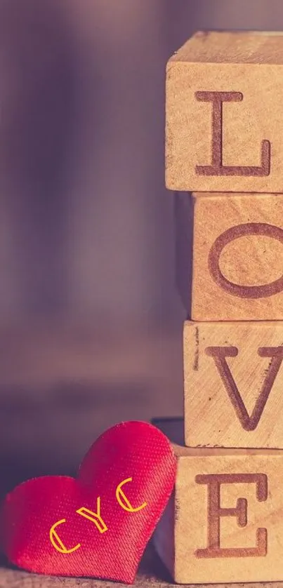 Wallpaper with wooden blocks spelling "LOVE" and a heart accent.