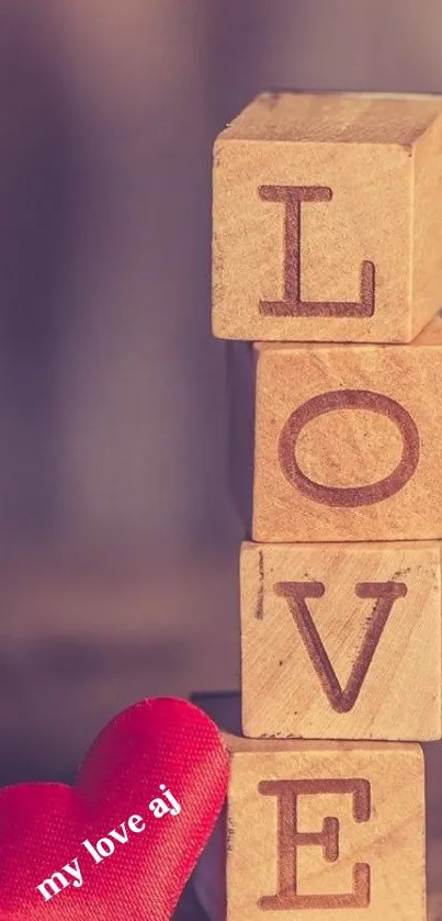 Wooden blocks spelling love with red heart.