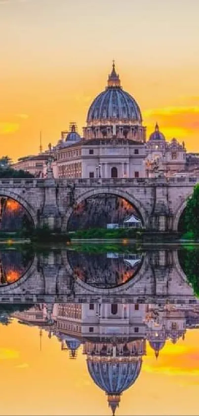 Rome sunset reflection of dome and bridge with orange glow on the water.