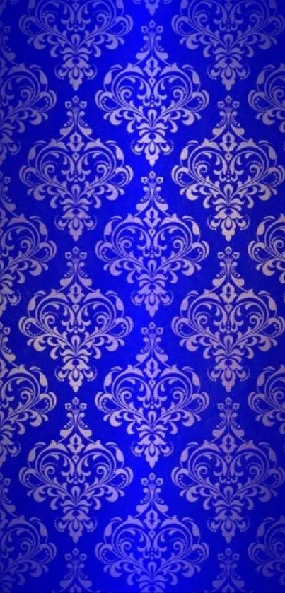 Royal blue patterned wallpaper with elegant Victorian motifs.