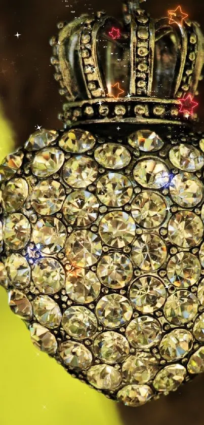 Jeweled heart with crown against a golden background in a mobile wallpaper.