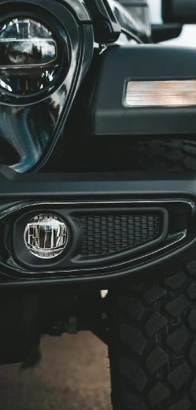 Close-up of Jeep front showcasing rugged design and off-road capability.