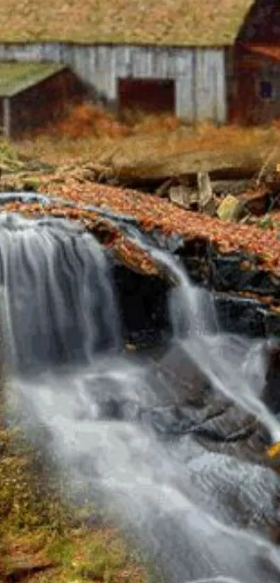 Autumn waterfall with a rustic barn amidst fall foliage, creating a serene mobile wallpaper.