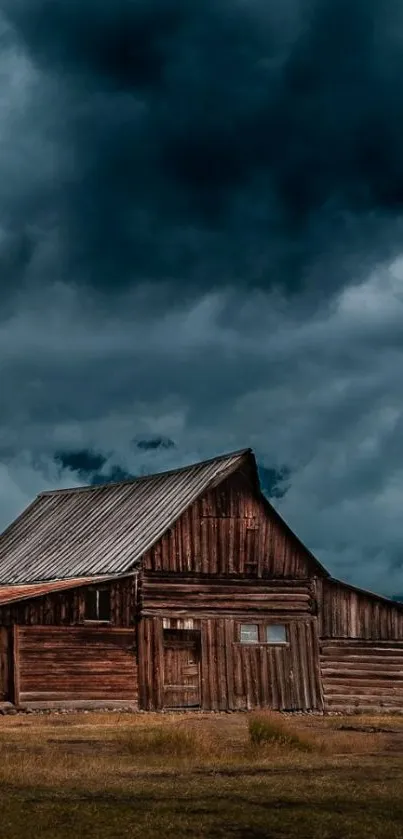 Rustic wooden barn under dark, stormy skies, creating a dramatic scene.