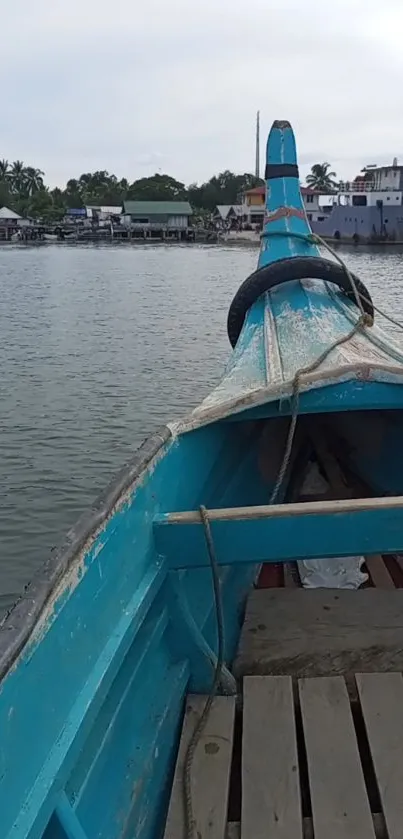 Rustic blue boat on a tranquil river.