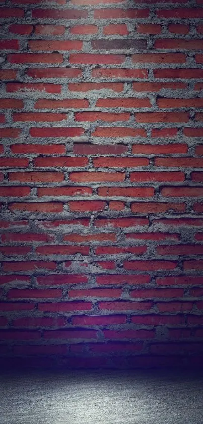 Rustic red brick wall with dramatic lighting and texture.