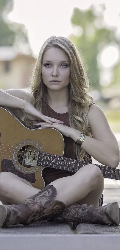 Woman with guitar sitting on rustic bridge.