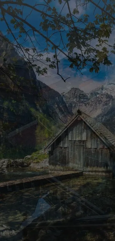 Rustic cabin nestled in scenic mountains with greenery and blue sky.