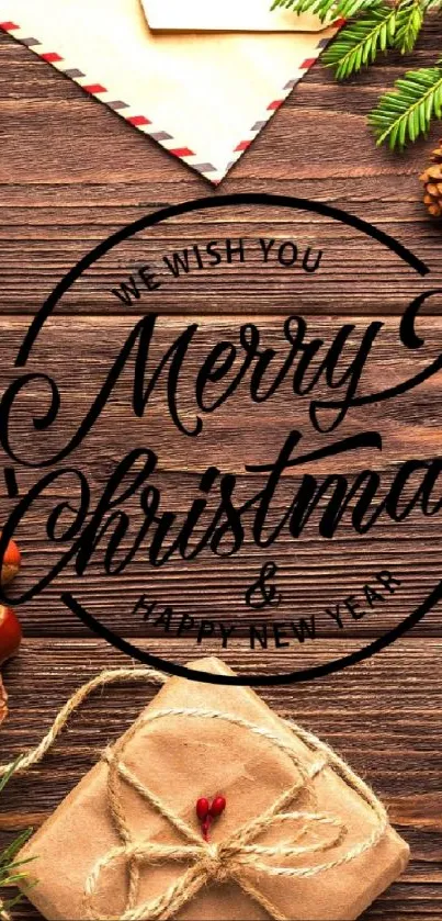 Rustic Christmas wallpaper with decorations and greeting on wooden background.