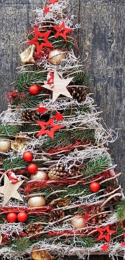 Rustic Christmas tree with red stars and pine cones on a dark wood background