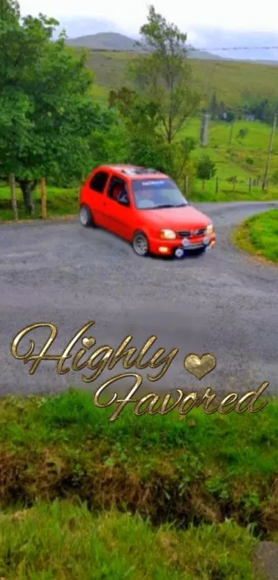 Red car on rural road with green landscape background.