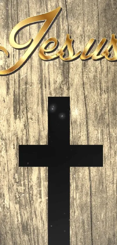 Rustic cross on wood with golden 'Jesus' text.