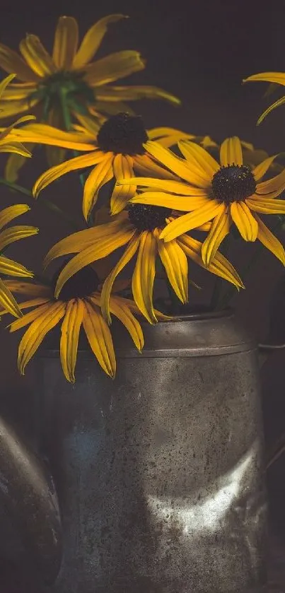 Yellow flowers in a rustic metal vase with a dark background.