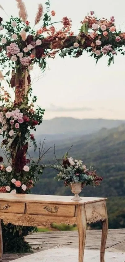 Rustic floral wedding arch with scenic backdrop on mobile wallpaper.