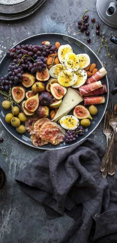 Rustic platter with figs, cheese, and eggs.