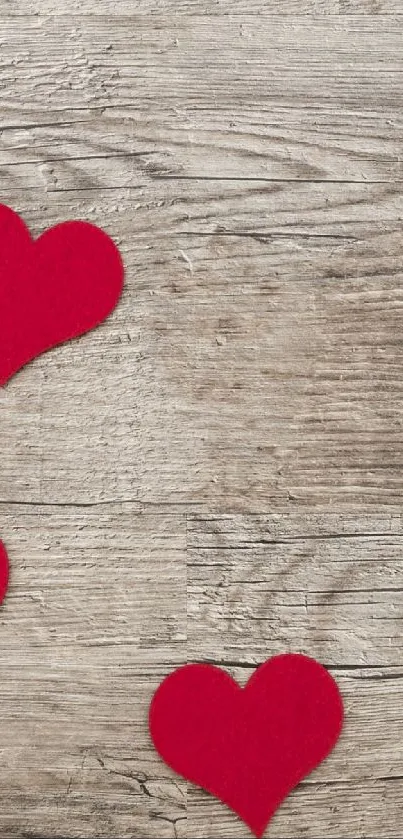 Rustic wood wallpaper with red hearts pattern.