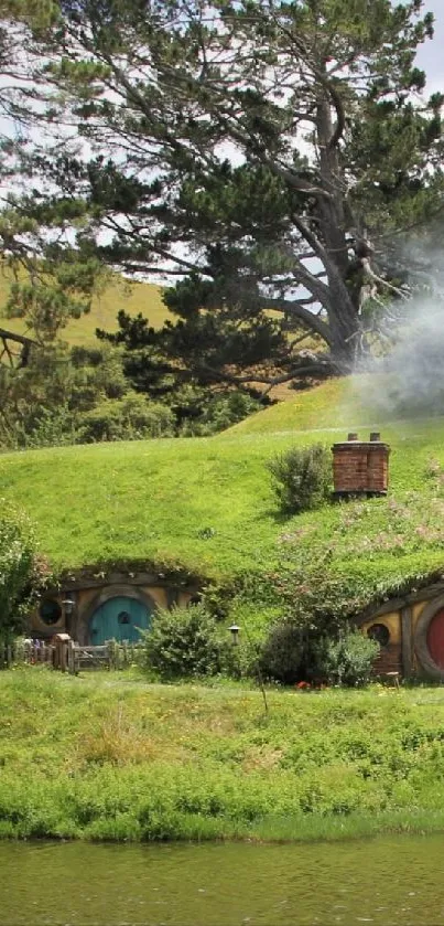 Hobbiton landscape with green hills and hobbit homes by a pond.