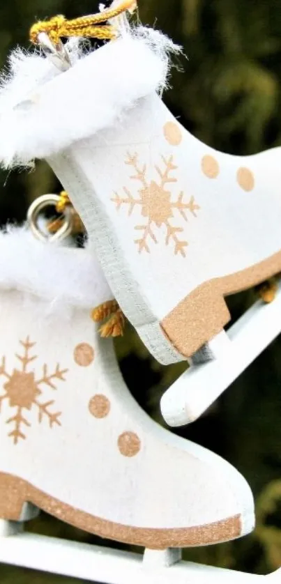 Rustic white ice skates with snowflake design on a green background.