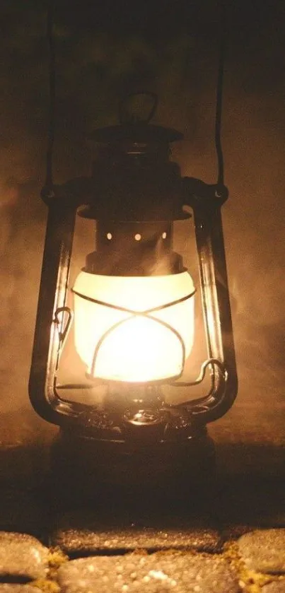 Rustic lantern casting a warm glow in the night fog.