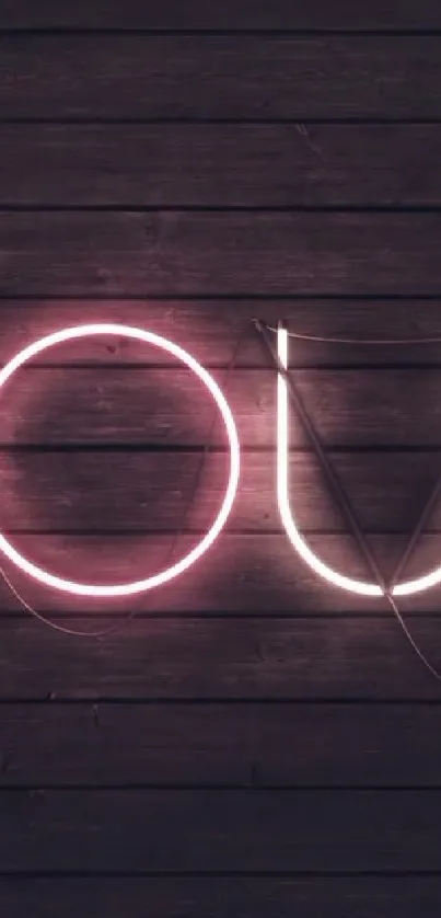 Rustic wooden wall with neon 'YOU' sign glowing softly.