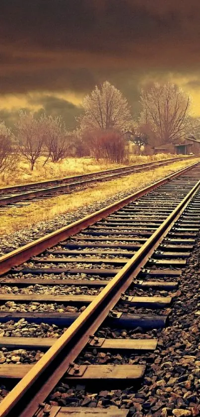 Rustic railway tracks under a vibrant, cloudy sky.