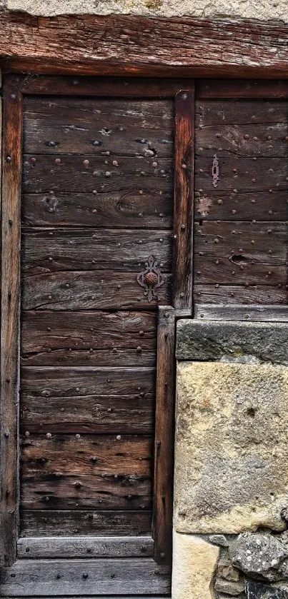 Rustic stone wall with a wooden door.